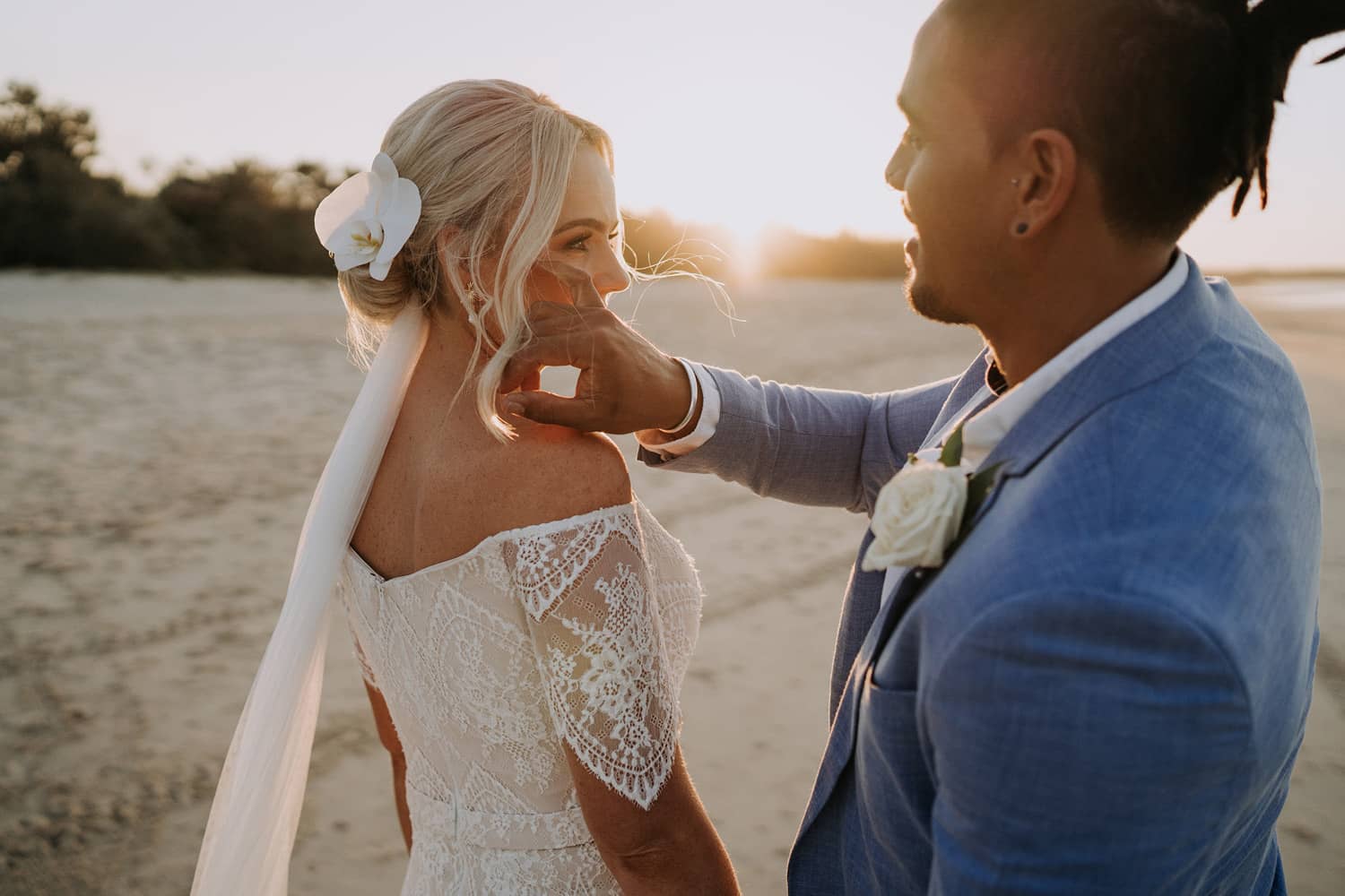 Bride and groom on beach