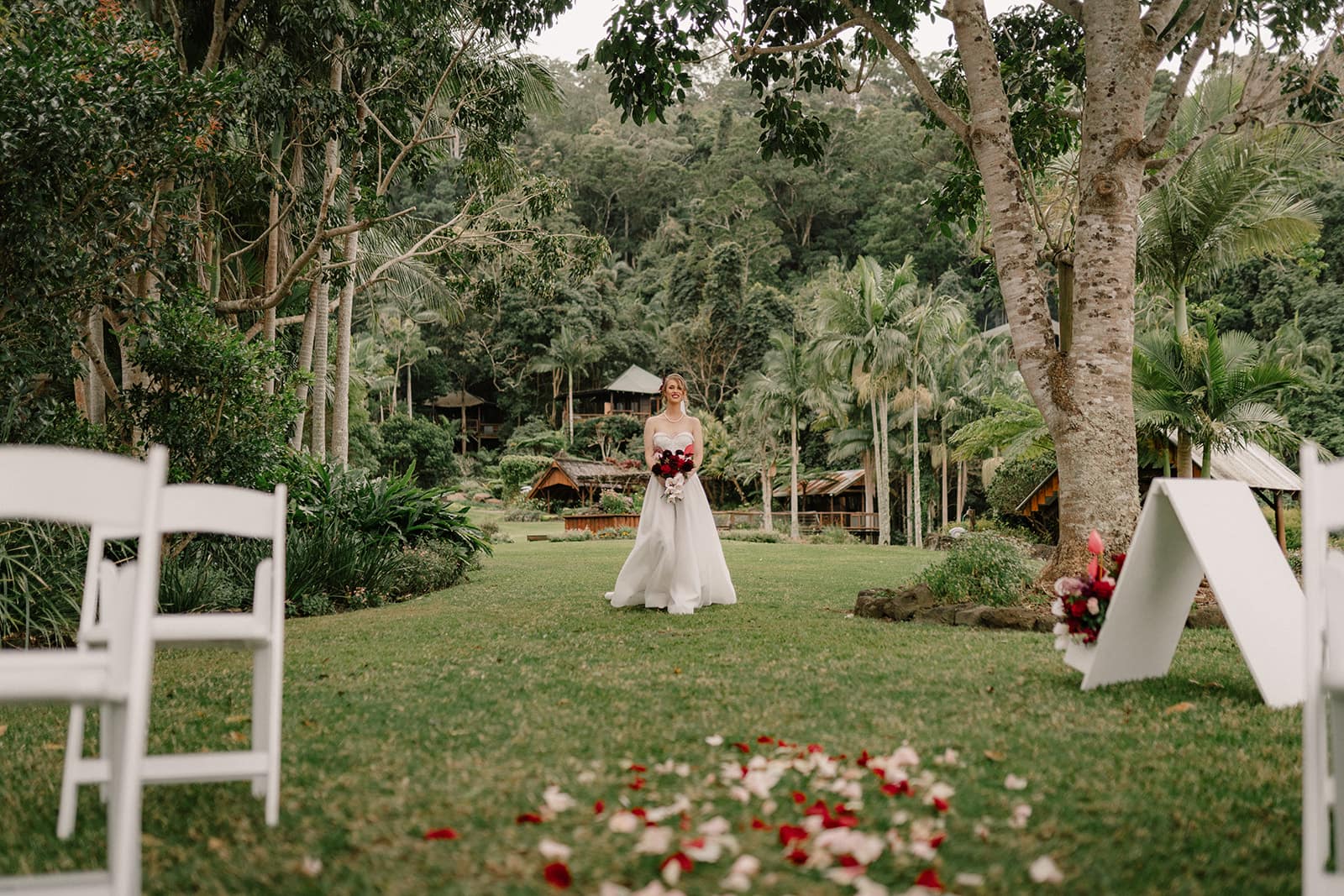 Ceremony in the gardens at Secrets on the Lake Montville wedding venue